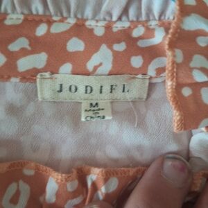 JODIFL Vibrant Orange and Cream Top